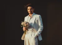 AI generated 90s Golden Hour White Suit Portrait | Vintage AI Look preview
