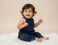 AI generated Joyful Blue Checkered Baby Portrait (Boy) - AI Milestone Photography preview